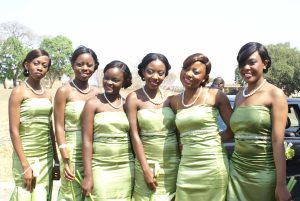 Bridesmaids in green dresses